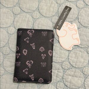 Compact Black Passport Wallet with Pink Animal Motif